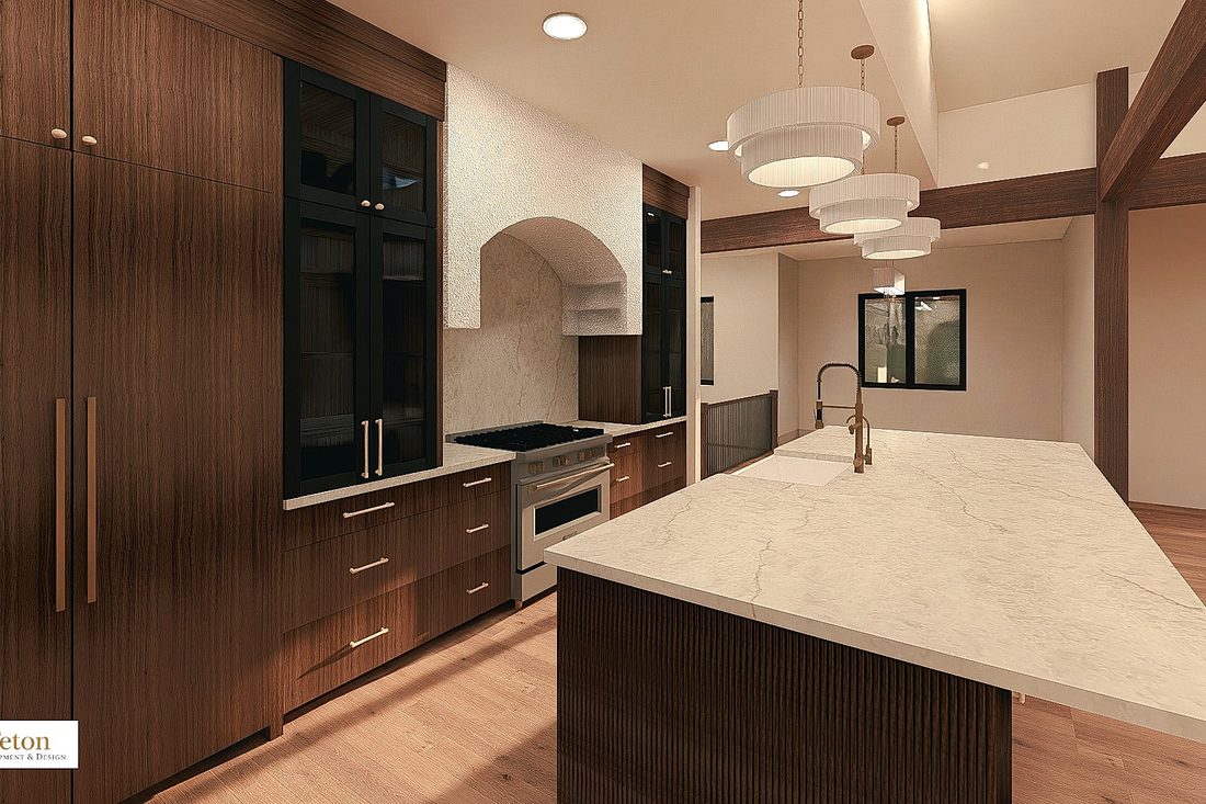Kitchen with custom wood cabinetry and a stone waterfall island